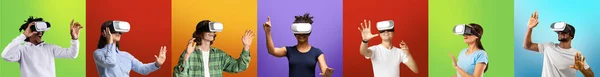 Surprised smiling young black, european people in casual clothes and virtual reality glasses controls game — Stockfoto