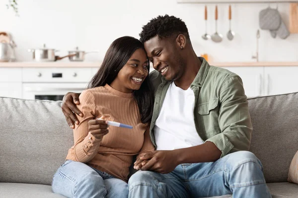 African american couple with positive results of pregnancy test — 스톡 사진