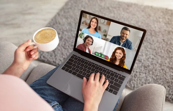 Unrecognizable woman having video chat with friends and drinking coffee — Stock Photo, Image
