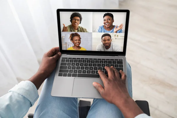 Black man in wheelchair using computer, having online party — Stock Photo, Image