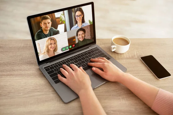 Unrecognizable woman having video call on laptop at home — Stock Photo, Image