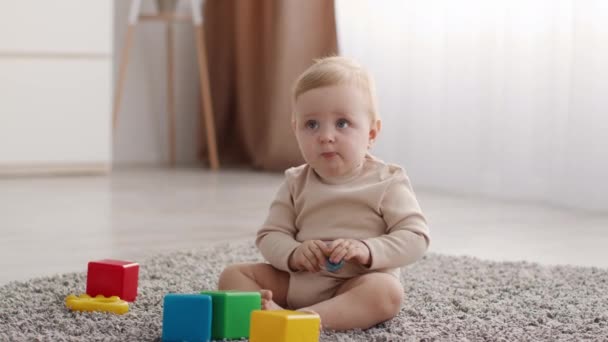 Baby Care. Portrait Of Cute Little Infant Child Posing In Home Interior — Stock Video
