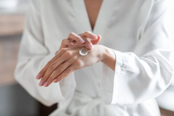 Closeup Shot Of Unrecognizable Female Using Moisturising Cream For Hands At Home — Stock Photo, Image