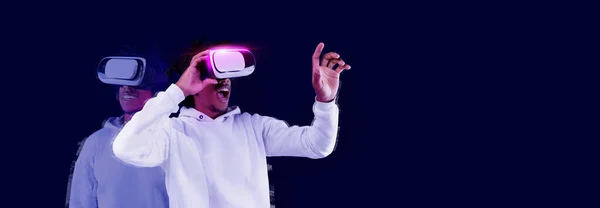 Excited young African American guy using VR glasses — Stock Photo, Image