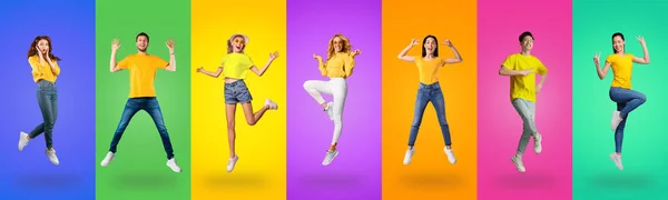 Carefree international group of millennials jumping up — Fotografia de Stock