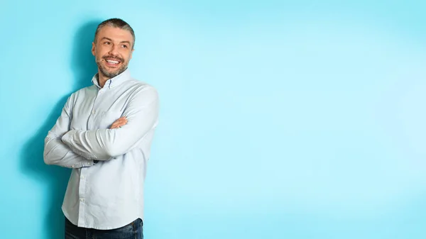 Middle Aged Man Posing Looking Aside Over Blue Background, Panorama — Photo