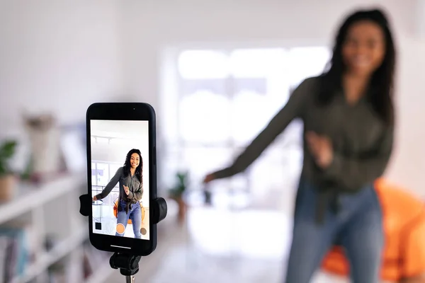 Cheerful black woman filming her dance on smart phone — Photo