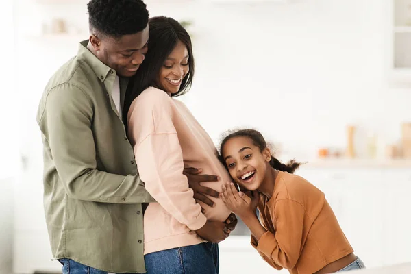 Happy Black Family Hugging Expecting Baby In Kitchen At Home — Stock Photo, Image