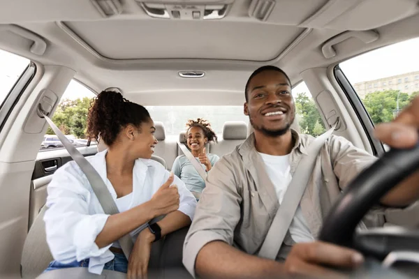 Happy Black Family Driving Own Car Gesturing Thumbs Up