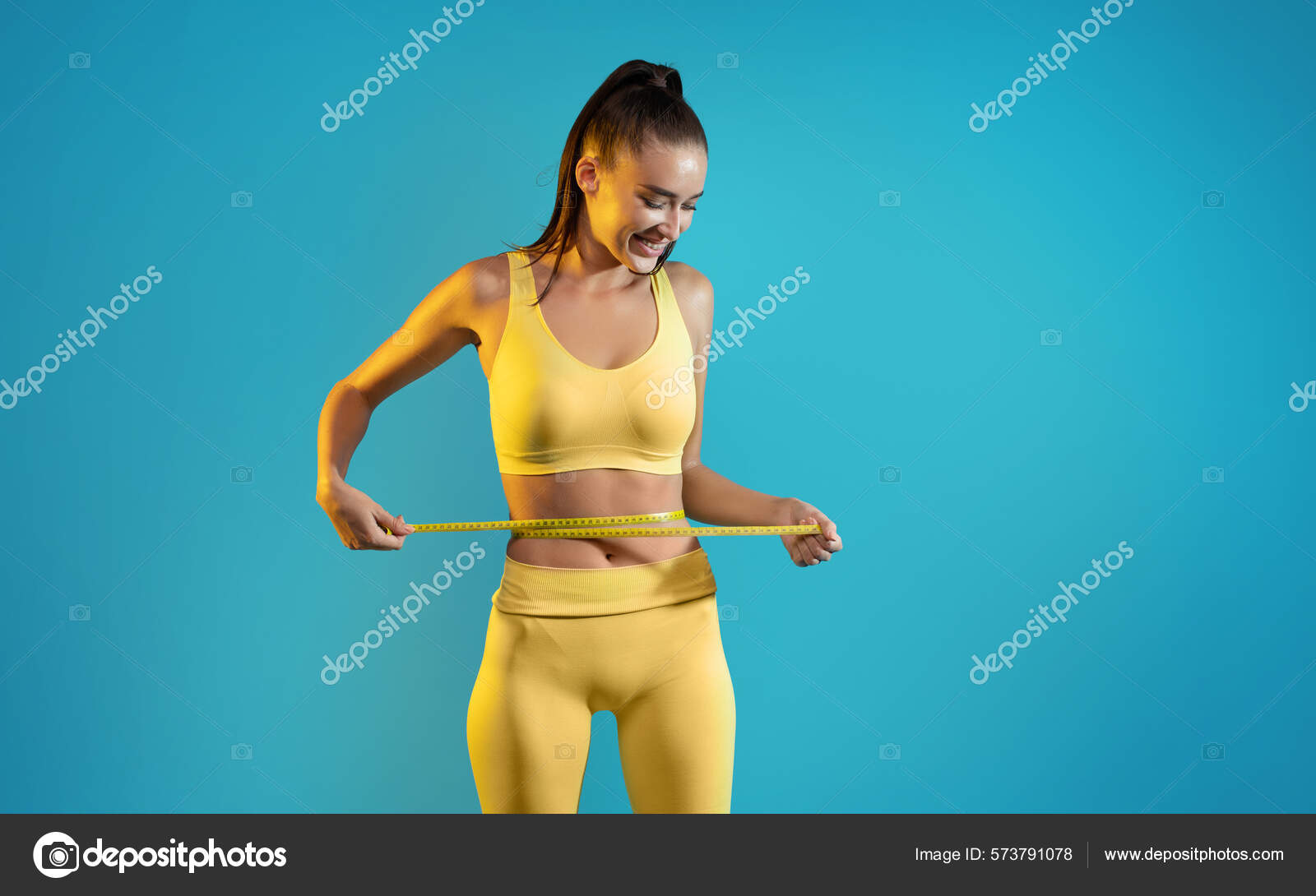 https://st.depositphotos.com/4218696/57379/i/1600/depositphotos_573791078-stock-photo-weight-loss-sporty-woman-tape.jpg