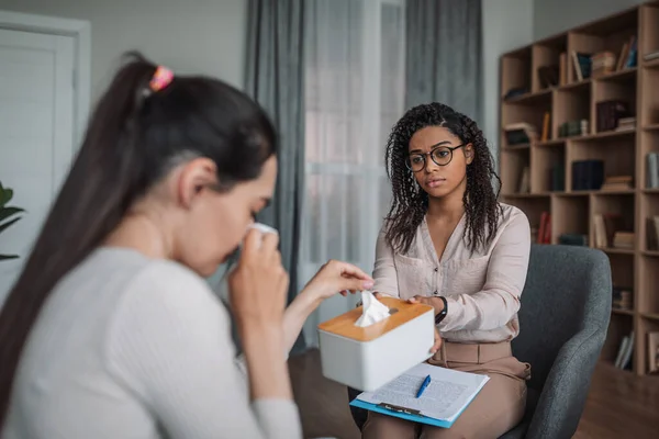 Sad Young Black Lady Psychologist Consulting Crying European Woman Clinic — Stock Photo, Image