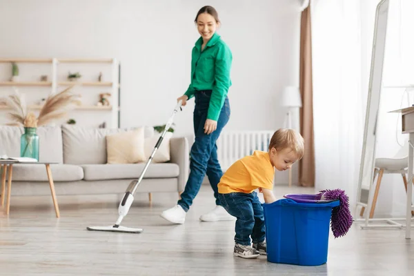 Little Boy Helping Young Mother Cleaning Home Child Getting Rag — Stock Photo, Image