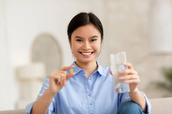 Smiling Pretty Asian Woman Blue Shirt Holding Glass Fresh Water — Stok Foto