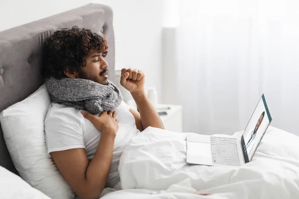 Sick Millennial Indian Man Scarf Neck Staying Bed Coughing Touching — Stock Photo, Image