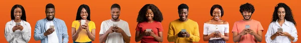 Крутий Додаток Group Young Black People Using Smartphone Orange Background — стокове фото