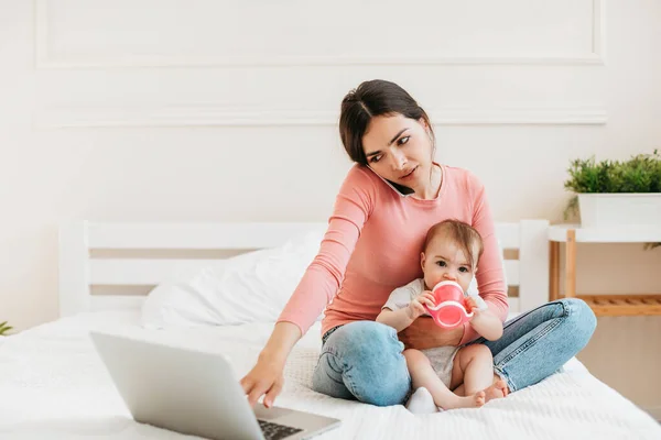 Remote Business Busy Young Mom Baby Working Laptop Smartphone Home — Stock Photo, Image