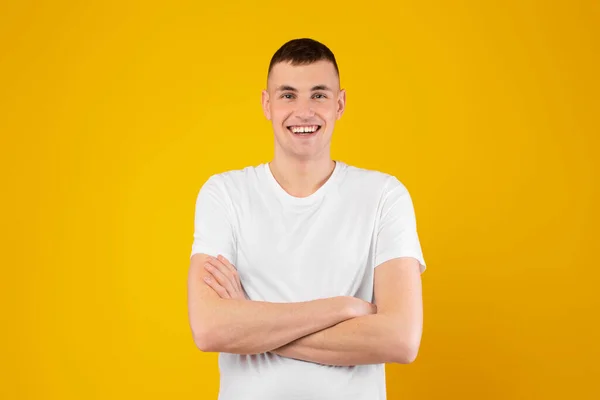 Handsome Young Man Smiling Camera Posing Crossing Hands Standing Yellow — Stock Photo, Image