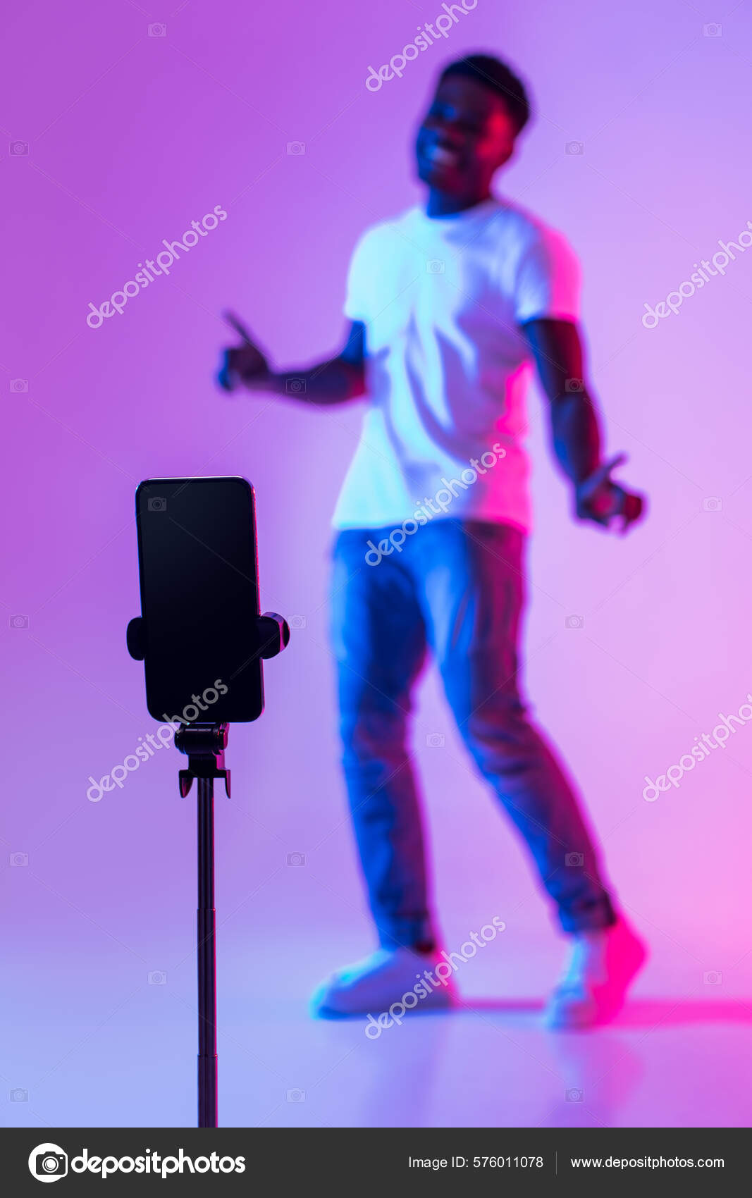 Black Male Vlogger Shooting Video Social Media Cellphone Having Fun Stock Photo by ©Milkos 576011078