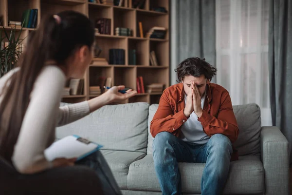 European Millennial Woman Doctor Psychologist Calming Crying Unhappy Male Client — Stock Photo, Image