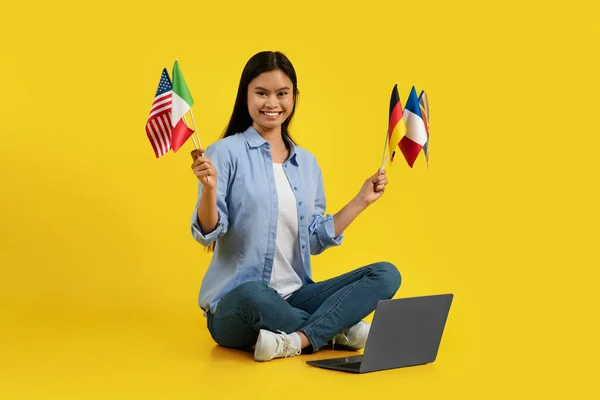 Glad Millennial Korean Woman Teacher Many Different Flags Sitting Floor — Stock Photo, Image