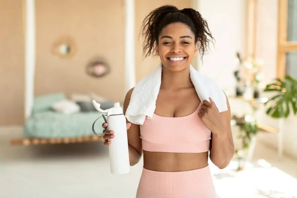 Portrait Fit Black Woman Sportswear White Towel Neck Holding Shaker — Stockfoto