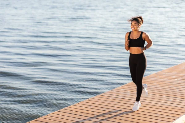 Happy Sporty Millennial Black Lady Jogging City Lake Park Alone — Foto de Stock