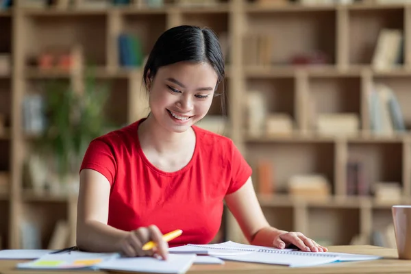 Glad Cheerful Pretty Smart Young Asian Lady Student Study Table — Stockfoto