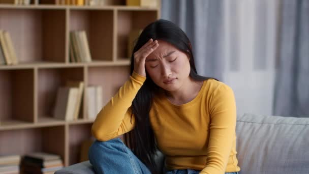 Migraine Concept Indoors Portrait Young Asian Woman Suffering Acute Headache — Stockvideo