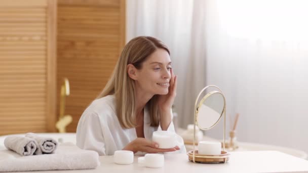 Wellbeing Concept Pretty Lady Wearing Bathrobe Applying Pampering Cream Her — Stock Video