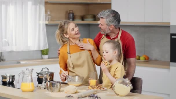 Snack Time Cute Little Girl Eating Cookie Drinking Juice Kitchen – Stock-video