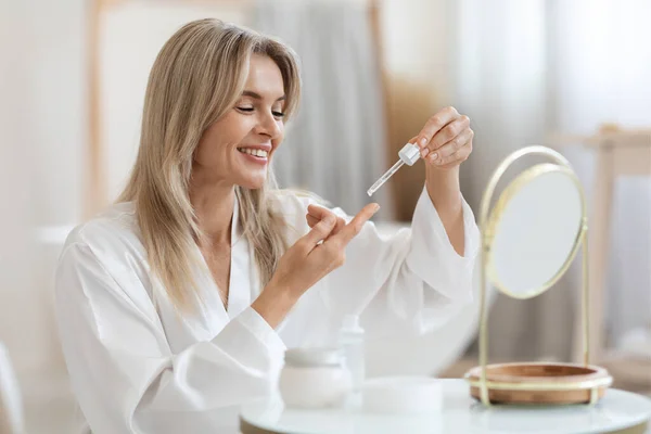 Happy Beautiful Middle Aged Woman Bathrobe Sitting Front Mirror Holding — Stock Photo, Image