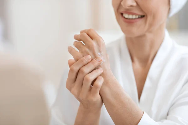 Unrecognizable Woman White Bathrobe Using Hand Cream Shower Cropped Beautiful — Stock Photo, Image