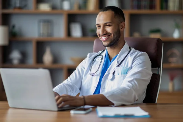 Handsome Young Middle Eastern Man Workwear Doctor Working Computer Clinic — 图库照片