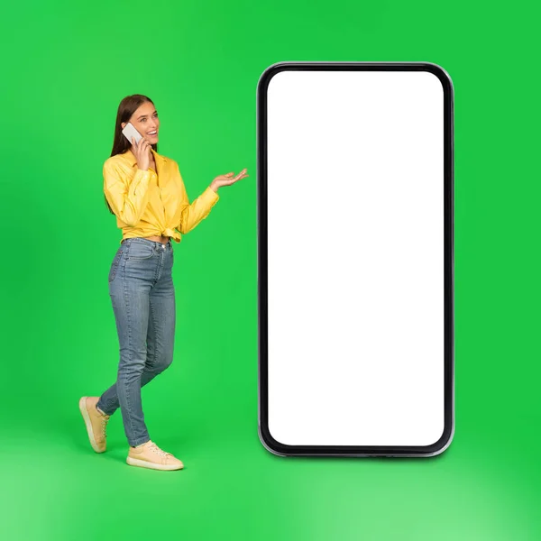 Happy Lady Talking Cellphone Walking Huge Smartphone Blank Screen Green — Stok fotoğraf