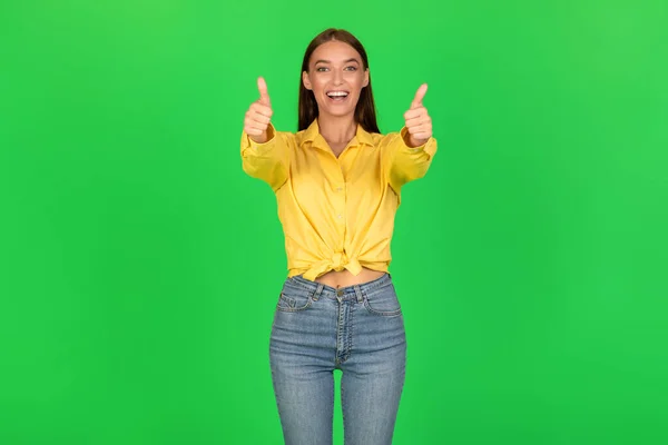 Happy Female Gesturing Thumbs Both Hands Smiling Camera Standing Green — 图库照片