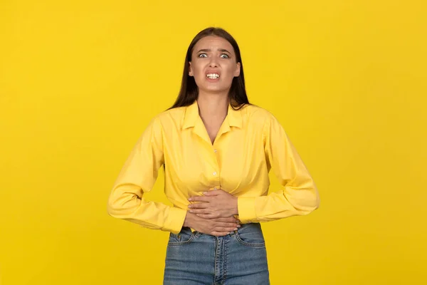 Unhappy Woman Touching Abdomen Suffering Stomachache Hunger Looking Camera Posing — Stockfoto