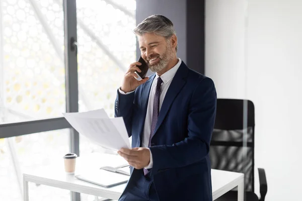 Smiling Middle Aged Businessman Talking Cellphone Checking Papers Office Handsome — Foto de Stock