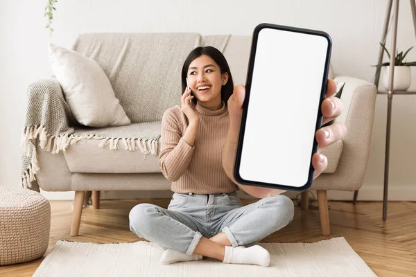 Happy Asian Woman Talking Phone Showing Big Blank Smartphone Camera — Stok fotoğraf