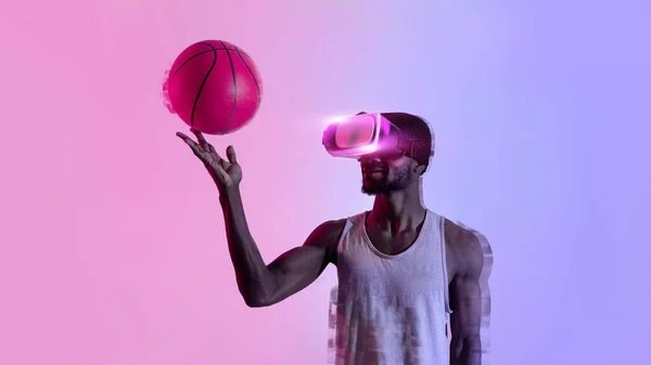 Millennial black basketballer playing with ball in virtual reality headset, neon lighting. Fit athlete using modern VR technologies to train for game competition, panorama with bank space, collage
