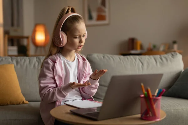 Little Girl Video Calling Learning Online Talking Laptop Wearing Earphones — Fotografia de Stock