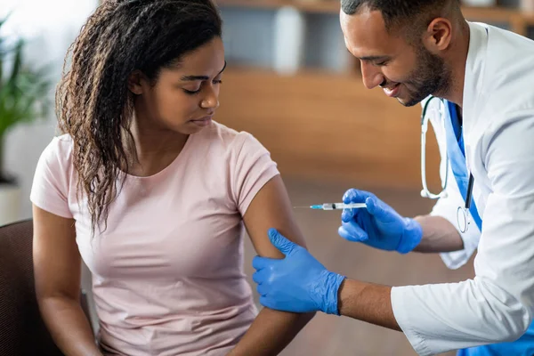 Young Black Lady Getting Vaccinated Coronavirus Male Doctor Handsome Middle — Stock Fotó