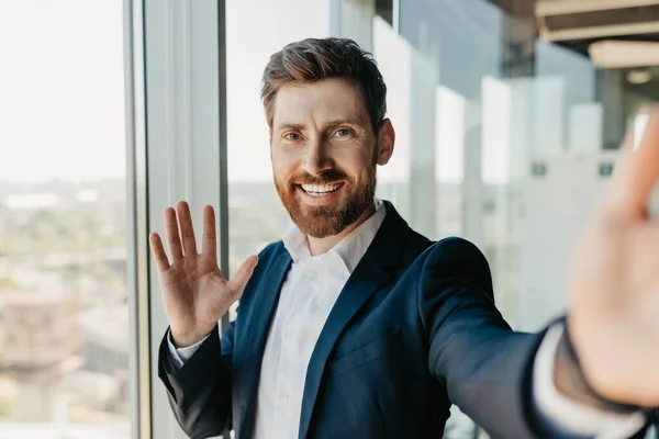 Happy Successful Businessman Beard Suit Waving His Hand Smartphone Camera — Foto de Stock