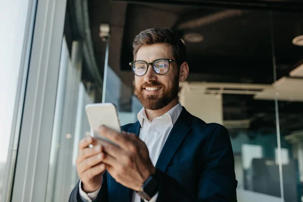 Happy Successful Businessman Glasses Typing Smartphone Modern Office Interior Having — Foto de Stock