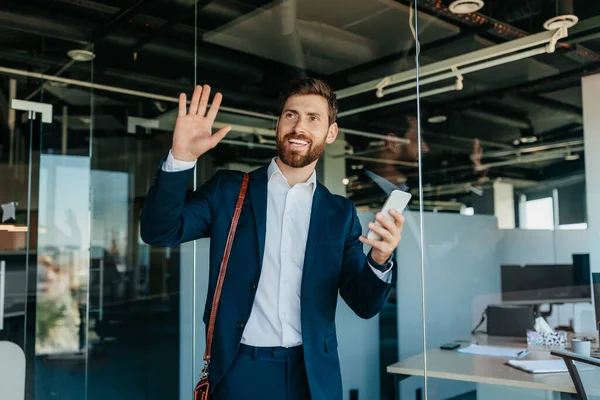 Happy Male Office Worker Suit Entering Office Space Smiling Waving — Stock Photo, Image