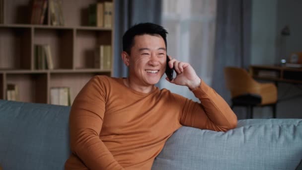 Male Friendship Indoors Portrait Positive Middle Aged Asian Man Talking — стоковое видео