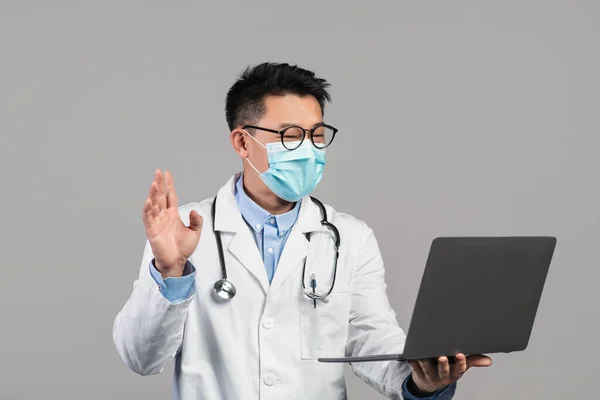 Cheerful Mature Chinese Man Doctor White Coat Glasses Protective Mask — Φωτογραφία Αρχείου