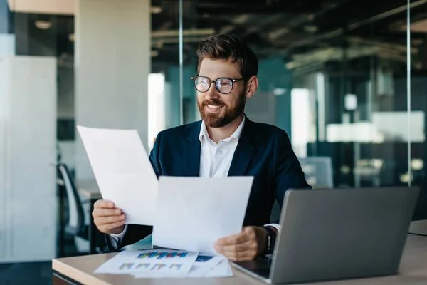 Happy Businessman Reading Papers Business Reports Rejoicing Affairs Company Sitting — стоковое фото