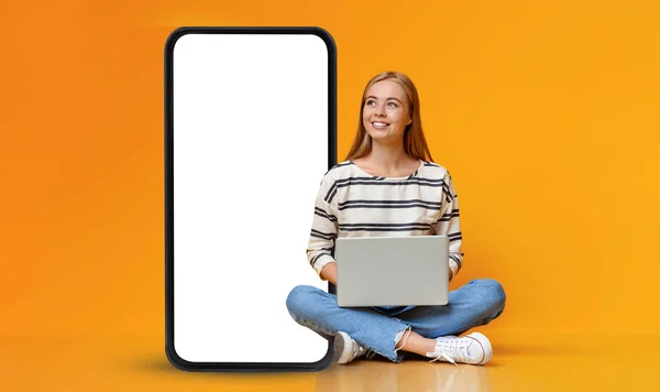 Dreamy Teenage Girl Sitting Laptop Floor Looking Huge Mobile Phone — Photo