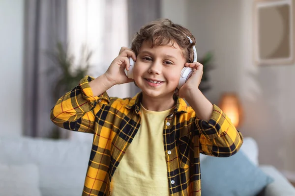 Close Portrait Adorable Happy Little Boy Enjoying Music Wireless Headphones — Stockfoto