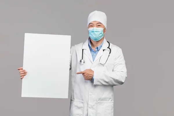 Smiling Adult Korean Man White Coat Protective Mask Stethoscope Points —  Fotos de Stock